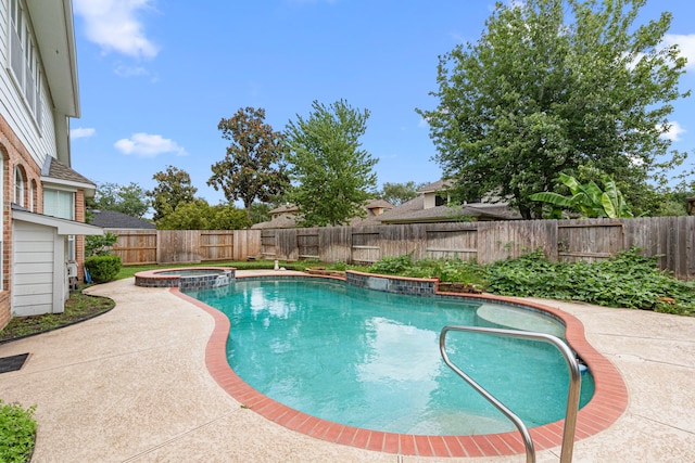 1807 Rustic Hills Ct, Sugar Land, TX 77479 - view of swimming pool featuring a fenced backyard, a patio area, and a pool with connected hot tub