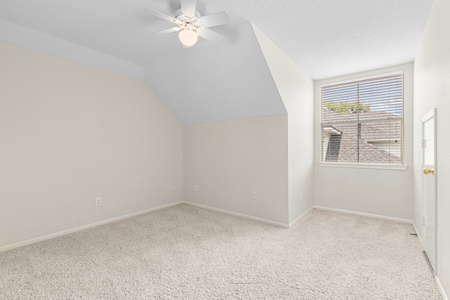1807 Rustic Hills Ct, Sugar Land, TX 77479 - additional living space featuring vaulted ceiling, ceiling fan, carpet, and baseboards