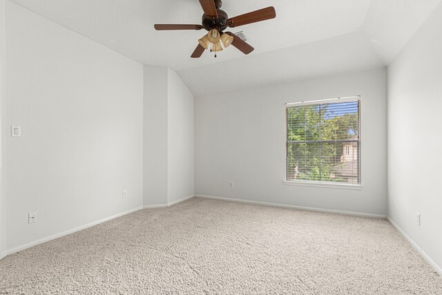 1807 Rustic Hills Ct, Sugar Land, TX 77479 - carpeted spare room with vaulted ceiling, ceiling fan, and baseboards