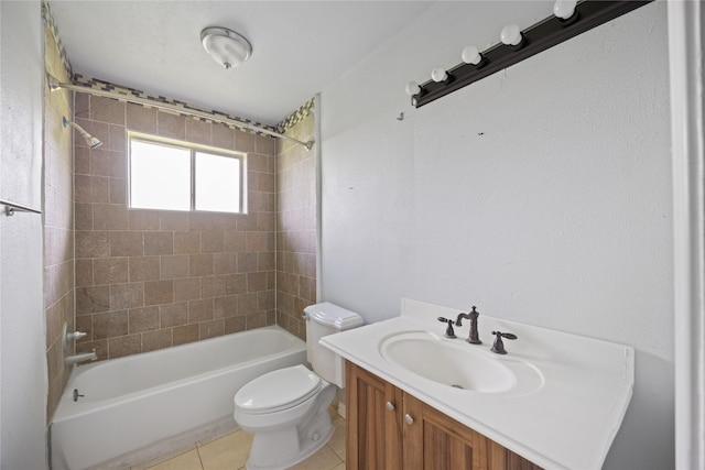 bathroom with toilet, tile patterned flooring, bathing tub / shower combination, and vanity