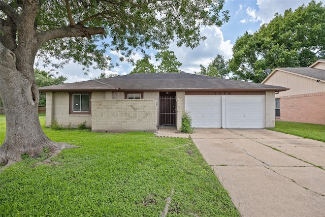 ranch-style house with brick siding, an attached garage, and concrete driveway