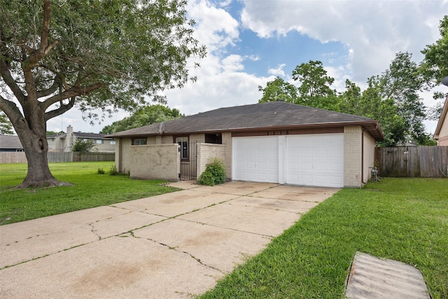 view of front of property featuring brick siding, driveway, a garage, and a gate