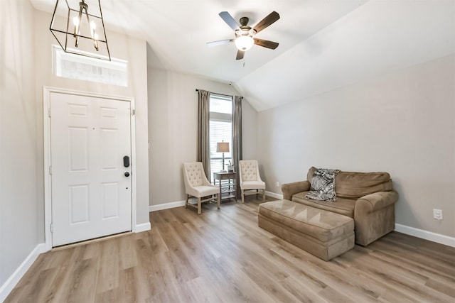 20810 Oak Rain Ct, Katy, TX 77449 - living area with baseboards, light wood finished floors, a ceiling fan, and vaulted ceiling