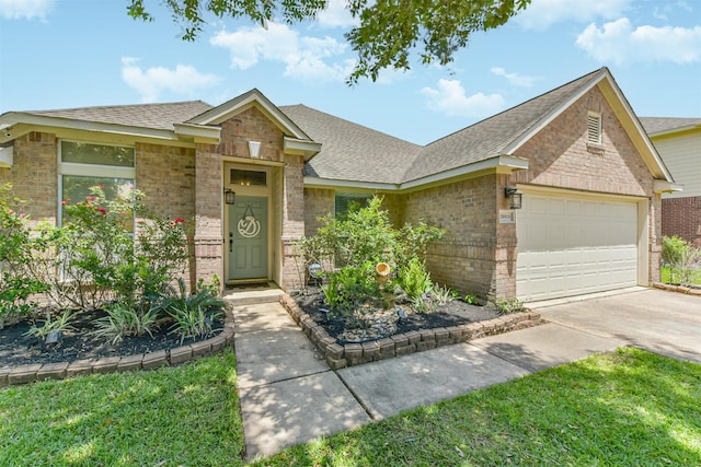 20810 Oak Rain Ct, Katy, TX 77449 - view of front facade featuring a garage, roof with shingles, concrete driveway, and brick siding
