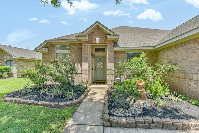 20810 Oak Rain Ct, Katy, TX 77449 - view of front facade featuring a shingled roof and brick siding