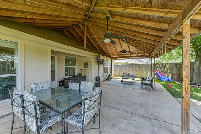 20810 Oak Rain Ct, Katy, TX 77449 - view of patio with fence, a ceiling fan, outdoor dining area, and an outdoor living space