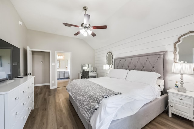 20810 Oak Rain Ct, Katy, TX 77449 - bedroom with vaulted ceiling, dark wood finished floors, ensuite bathroom, baseboards, and ceiling fan
