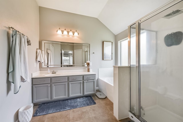 20810 Oak Rain Ct, Katy, TX 77449 - bathroom with vaulted ceiling, a shower stall, vanity, tile patterned floors, and a bath