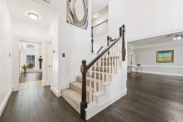 17414 Naremore Ct, Spring, TX 77379 - stairs with wood finished floors, baseboards, ceiling fan, and ornamental molding