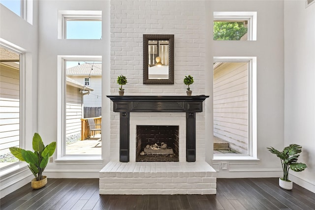 17414 Naremore Ct, Spring, TX 77379 - living room with hardwood / wood-style flooring, baseboards, plenty of natural light, and a high ceiling