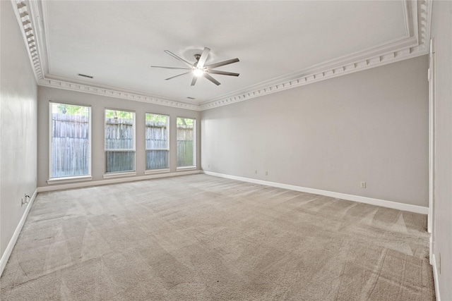 17414 Naremore Ct, Spring, TX 77379 - empty room featuring a ceiling fan, baseboards, light carpet, and ornamental molding