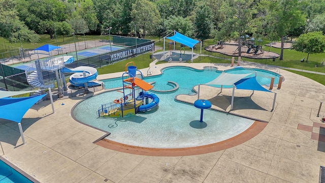 17414 Naremore Ct, Spring, TX 77379 - community pool with a water play area, a water slide, and a patio area