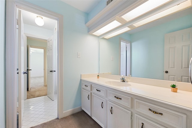 17414 Naremore Ct, Spring, TX 77379 - bathroom with vanity, tile patterned flooring, and baseboards