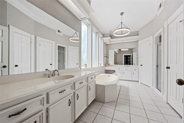 17414 Naremore Ct, Spring, TX 77379 - bathroom with a stall shower, crown molding, a bath, two vanities, and tile patterned floors