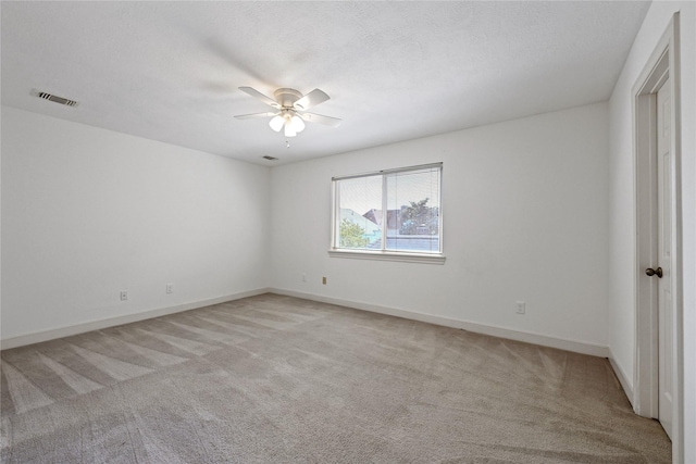 17414 Naremore Ct, Spring, TX 77379 - unfurnished room featuring light colored carpet, ceiling fan, and baseboards