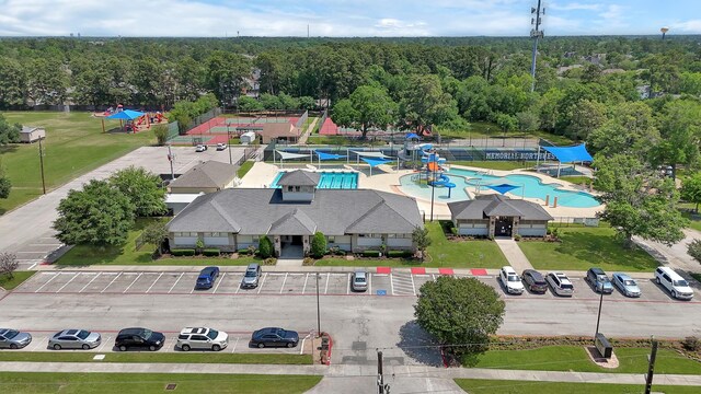 17414 Naremore Ct, Spring, TX 77379 - bird's eye view of a pool and a forest