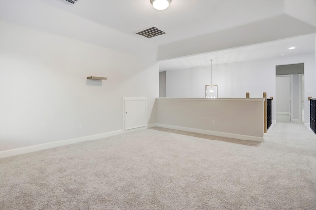 2327 Partridgeberry Ln, Katy, TX 77494 - empty room with light carpet, baseboards, recessed lighting, and vaulted ceiling