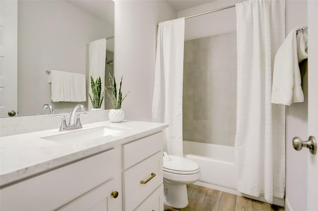 2327 Partridgeberry Ln, Katy, TX 77494 - full bath with toilet, wood finished floors, shower / tub combo with curtain, and vanity