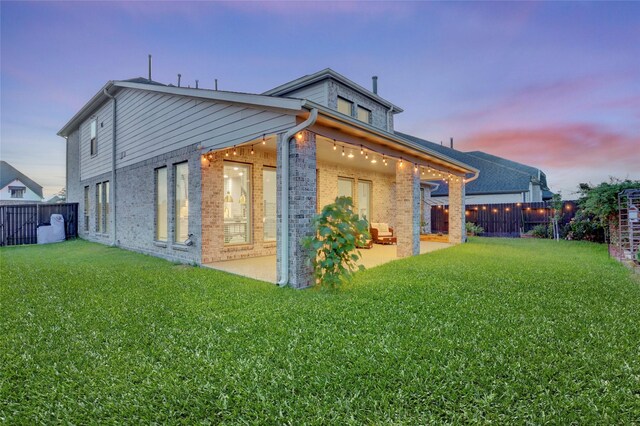 2327 Partridgeberry Ln, Katy, TX 77494 - back of house featuring a patio and brick siding