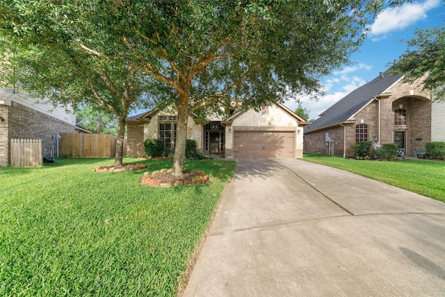 21606 Hansom Dr, Porter, TX 77365 - view of front of house featuring concrete driveway, an attached garage, and brick siding