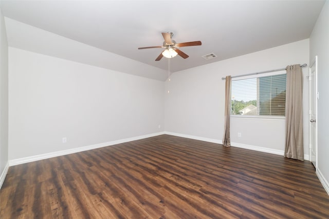21606 Hansom Dr, Porter, TX 77365 - spare room featuring a ceiling fan, baseboards, and dark wood-type flooring