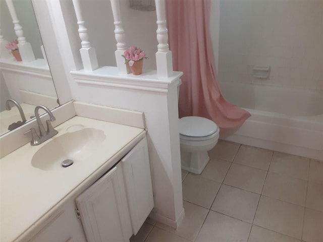 4927 Algernon Dr, Spring, TX 77373 - bathroom featuring tile patterned floors, toilet, vanity, and shower / tub combo with curtain