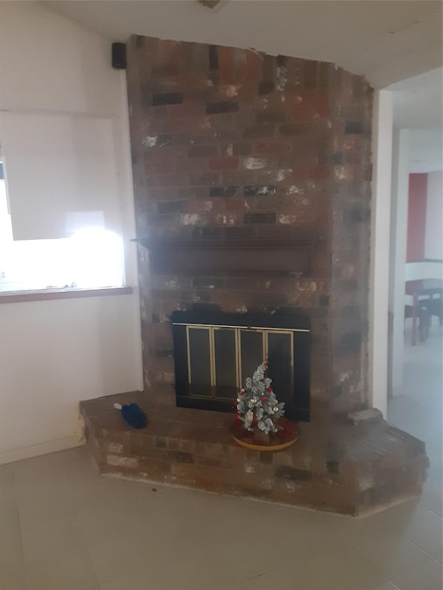 4927 Algernon Dr, Spring, TX 77373 - unfurnished living room featuring a fireplace and tile patterned flooring