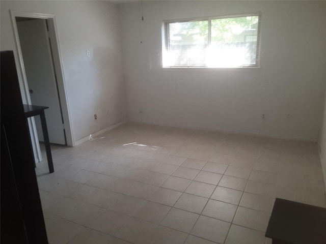 4927 Algernon Dr, Spring, TX 77373 - empty room with light tile patterned flooring