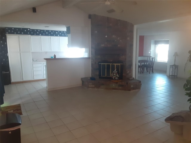 4927 Algernon Dr, Spring, TX 77373 - living area featuring light tile patterned floors, a fireplace, and ceiling fan