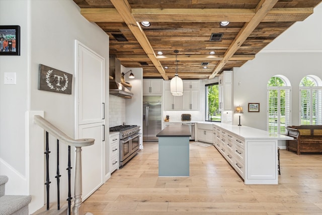 4323 Colony W Dr, Richmond, TX 77406 - kitchen featuring appliances with stainless steel finishes, wall chimney range hood, wood ceiling, light wood finished floors, and white cabinets