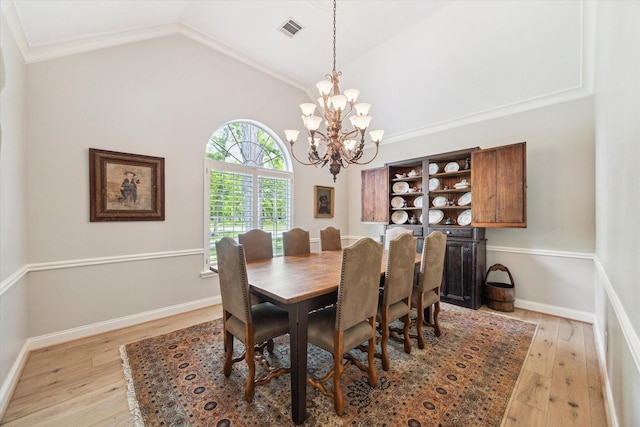 4323 Colony W Dr, Richmond, TX 77406 - dining room with light wood-style floors, a chandelier, and lofted ceiling