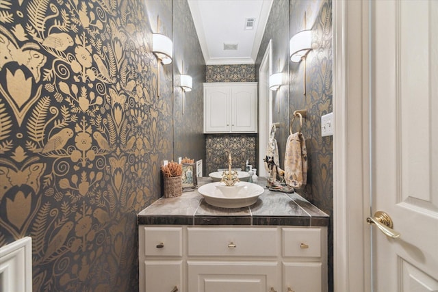 4323 Colony W Dr, Richmond, TX 77406 - bathroom featuring wallpapered walls, vanity, and ornamental molding