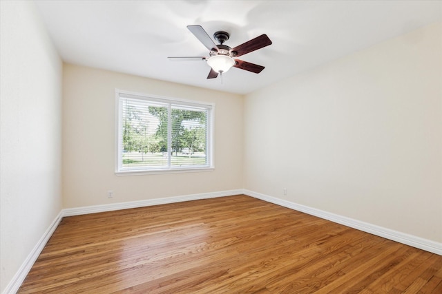 1803 Latexo Dr, Houston, TX 77018 - empty room with light wood finished floors, baseboards, and a ceiling fan