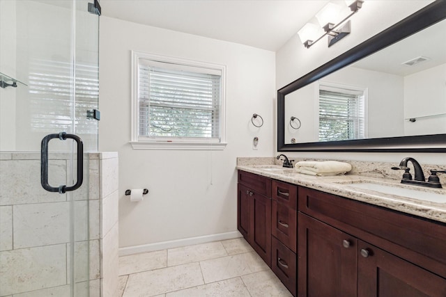 1803 Latexo Dr, Houston, TX 77018 - bathroom featuring double vanity, baseboards, and a shower stall