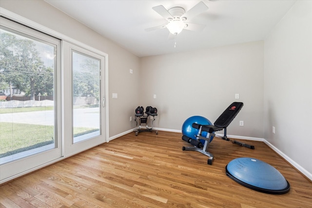 1803 Latexo Dr, Houston, TX 77018 - workout room featuring healthy amount of natural light, light wood-style flooring, and baseboards