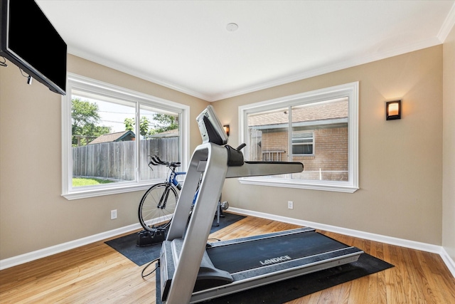 1803 Latexo Dr, Houston, TX 77018 - workout room featuring crown molding, wood finished floors, and baseboards
