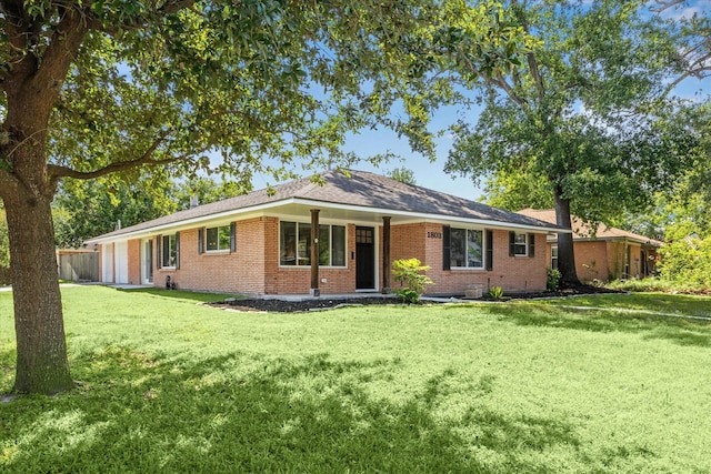 1803 Latexo Dr, Houston, TX 77018 - ranch-style home with brick siding and a front lawn