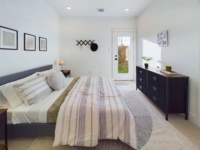 2710 Jensen Creek Ln, Houston, TX 77026 - bedroom with light carpet and recessed lighting
