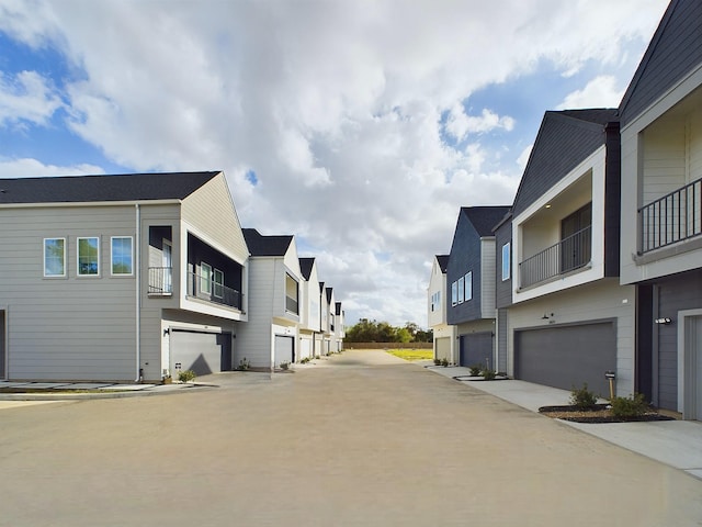 2710 Jensen Creek Ln, Houston, TX 77026 - view of concrete road featuring a residential view