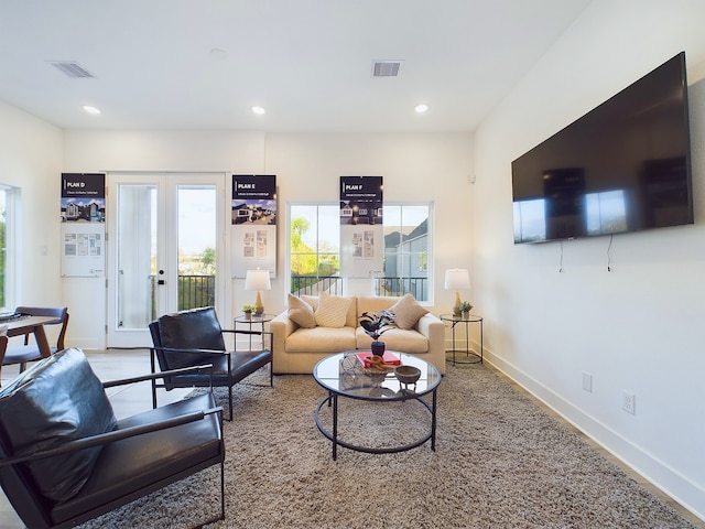 2710 Jensen Creek Ln, Houston, TX 77026 - living area featuring recessed lighting and french doors