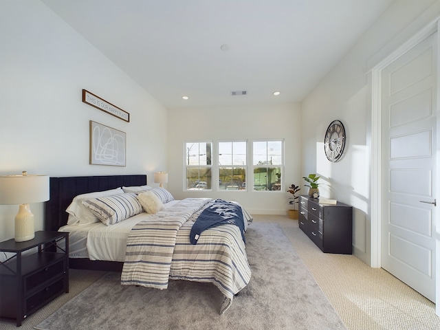 2710 Jensen Creek Ln, Houston, TX 77026 - bedroom with light carpet and recessed lighting