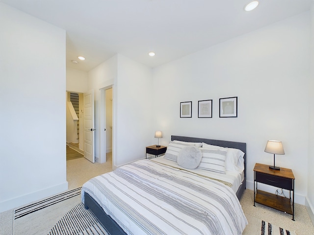 2710 Jensen Creek Ln, Houston, TX 77026 - bedroom featuring light colored carpet and recessed lighting
