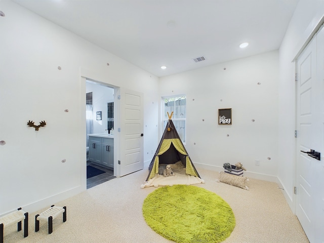 2710 Jensen Creek Ln, Houston, TX 77026 - game room with carpet flooring and recessed lighting