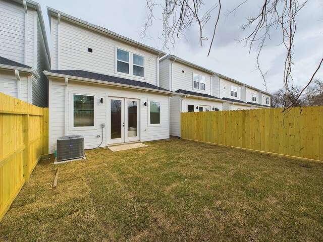 5914 Eastwood St, Houston, TX 77021 - back of property with french doors and central air condition unit