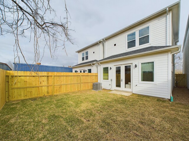 5914 Eastwood St, Houston, TX 77021 - back of property with french doors and cooling unit