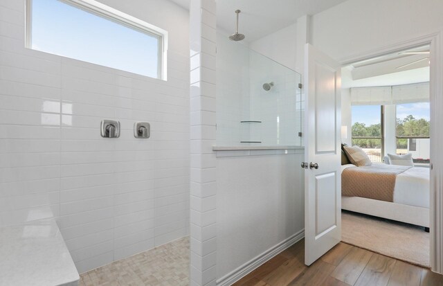 25701 Damask Dr, Magnolia, TX 77355 - ensuite bathroom with wood finished floors and walk in shower