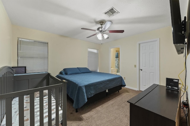 1314 Robert St, Baytown, TX 77521 - bedroom featuring light carpet, ceiling fan, and baseboards