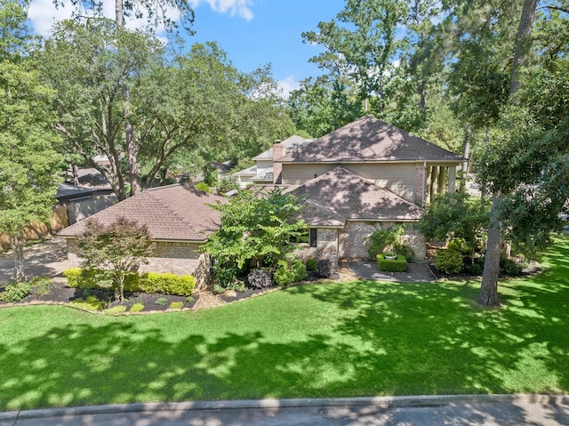 5610 Edgewick Ct, Houston, TX 77069 - view of front of home featuring a front lawn and brick siding