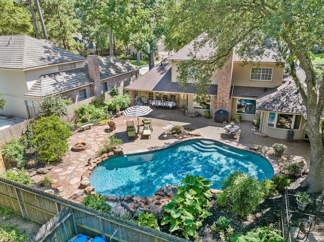 5610 Edgewick Ct, Houston, TX 77069 - view of swimming pool with an outdoor fire pit, a fenced backyard, and a patio