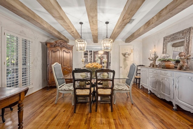 5610 Edgewick Ct, Houston, TX 77069 - dining space with beam ceiling, a chandelier, and light wood-type flooring